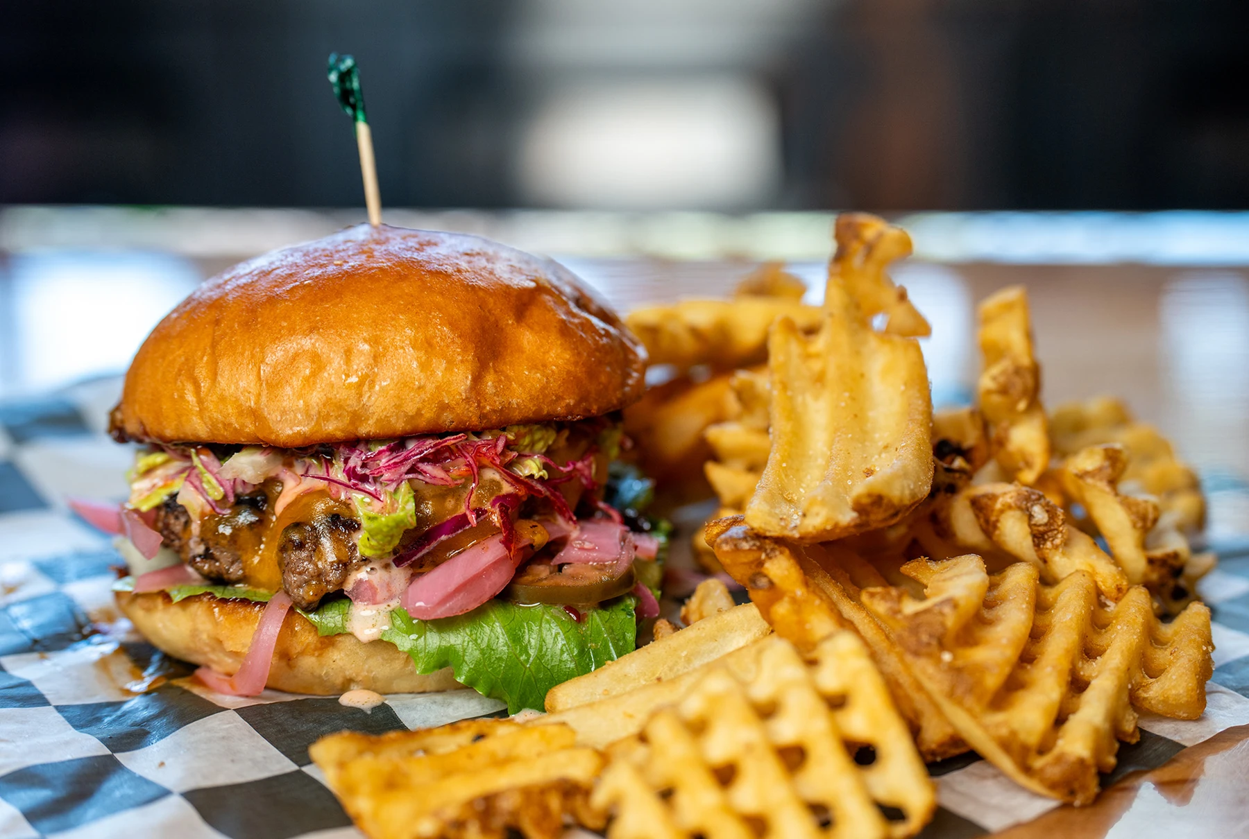 Burger and waffle fries